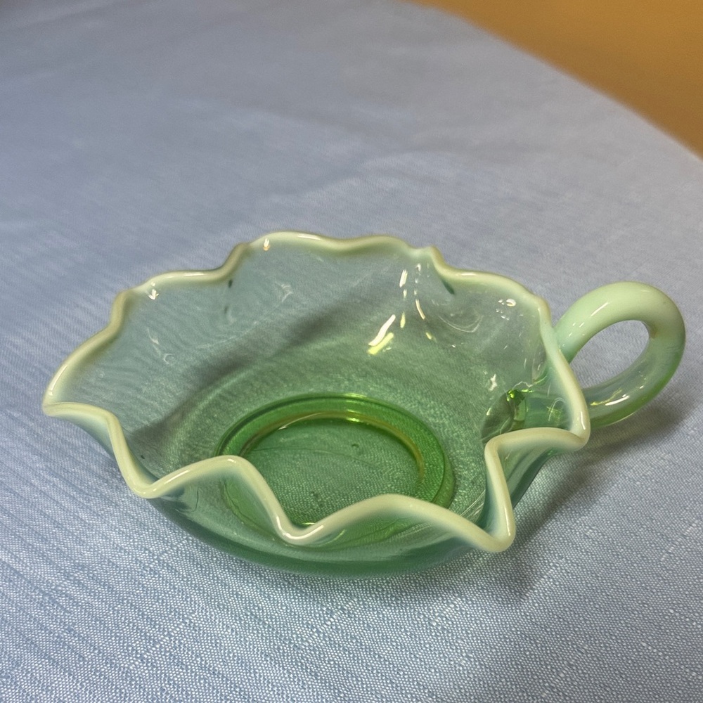 Dugan Glass opalescent Green Ruffled Nappy Dish with Handle 1906